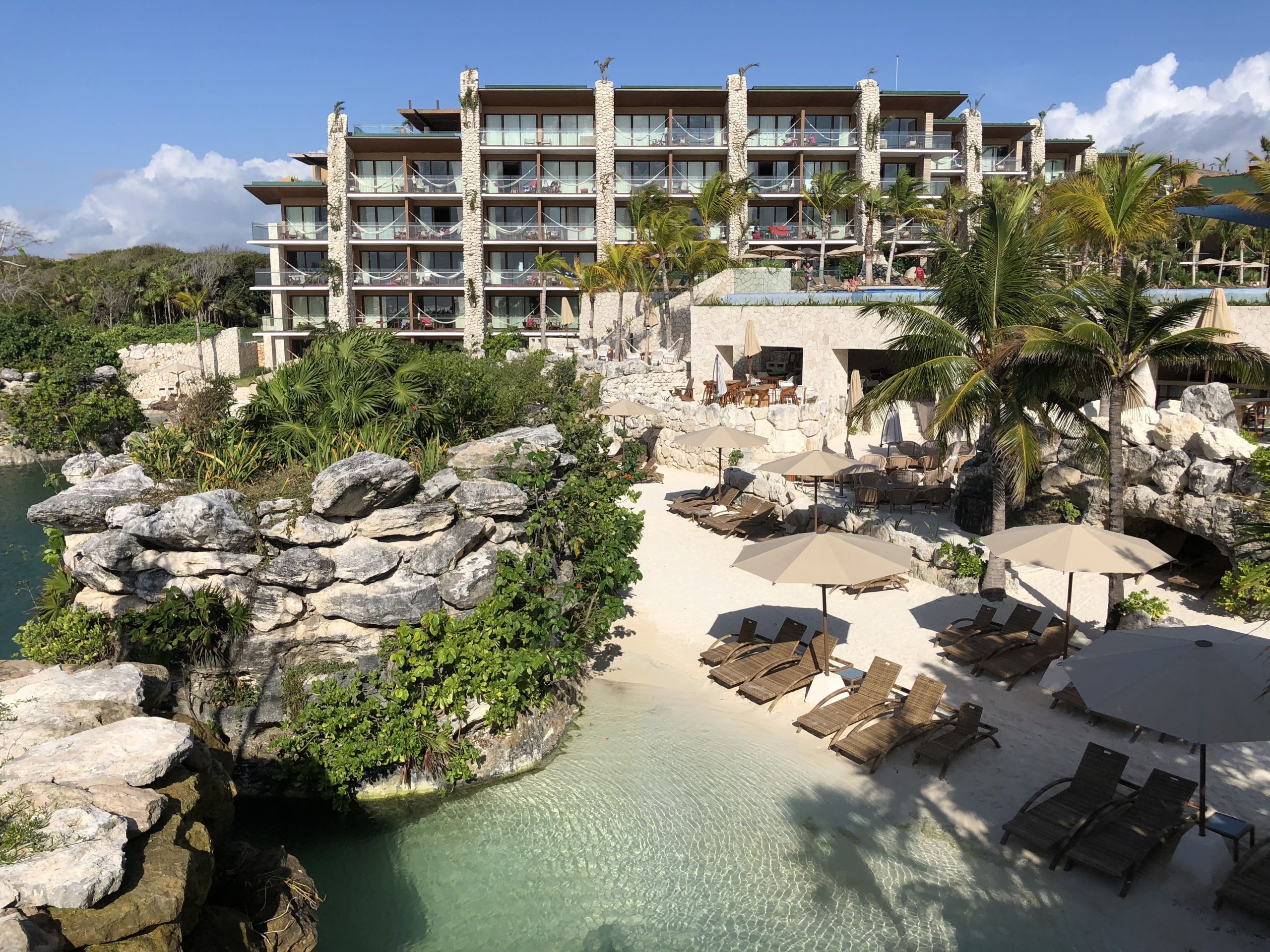 Natural lagoon pool at Hotel Xcaret Mexico, a top family all-inclusive resort in the Mexican Caribbean